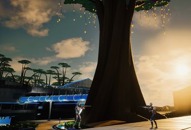 Two Kinetics on a sunlit walkway beneath the giant tree.